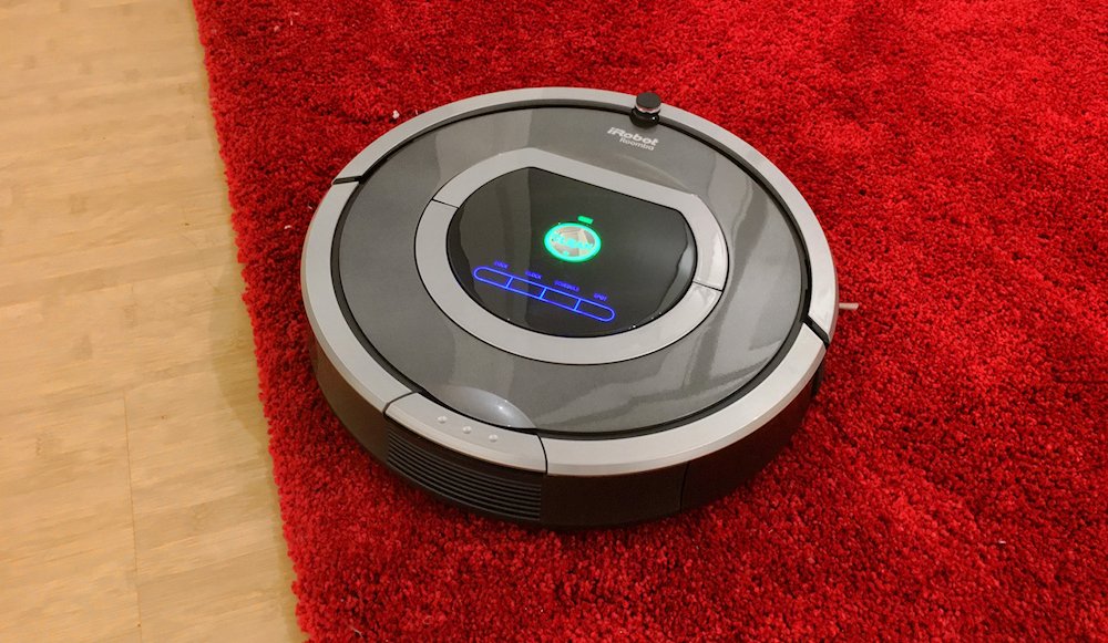 Irobot Roomba auf einem Teppich